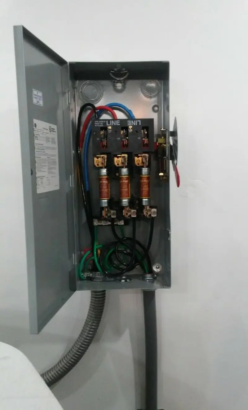Three-phase disconnect switch installed for Smoke Detector Installation in Kings Park